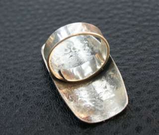 Ring measures approximately 0.9 inch ( 2.2 cm) high.