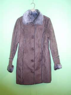 Ladies BROWN jacket 34 inch long , 2pockets . Stylish and easy to care 