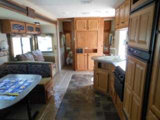 2011 NORTH COUNTRY 28BHSS SINGLE SLIDE TRAVEL TRAILER WITH BUNKS 