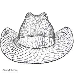 This hand tied wire hat measures approximately 11.75 long x 6 high 