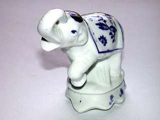 This auction is for an Oriental Blue on White Elephant Figurine.