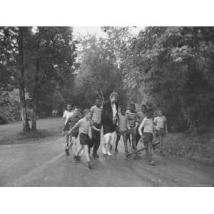  Former First Lady Eleanor Roosevelt Walking on Rustic Road 