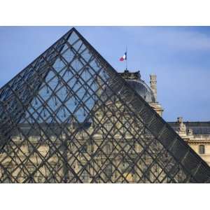  The Louvre as Seen Through the Glass Pyramid of its 