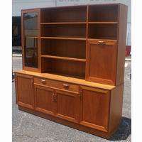   two piece construction cabinet wood and glass composition top has a
