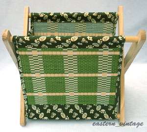 The materials of this box are bamboo, cloth and wood, medium size.