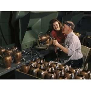  Man Solders Handles and Spouts to Teapots at an Oneida Factory 