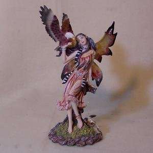  Fairy on Tree Stump Holding Eagle Fairy Figurine