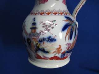   POLYCHROME BEARDED MAN HANDLE CHINOISERIE CHINESE RED PITCHER  