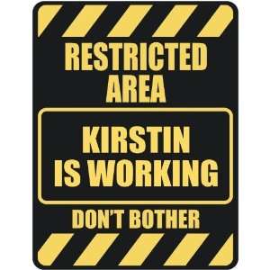   RESTRICTED AREA KIRSTIN IS WORKING  PARKING SIGN