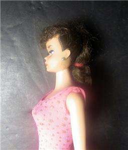 ears dark haired barbie has shoes one stand is included listing with a 