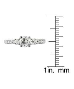Tressa Sterling Silver Round cut CZ Solitaire Ring  