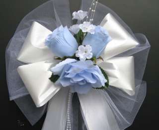   boutonnieres (1 L.blue rosebud, green leaves, white accent flowers