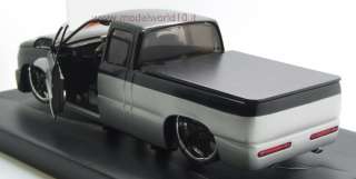 MALIBU INTERNATIONAL LEXANI 2004 CHEVROLET SILVERADO SILVER/BROWN