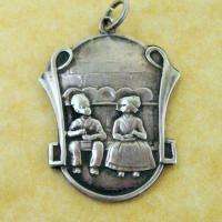 ANTIQUE ART NOUVEAU GERMAN SILVER 2 SIDED SIBLINGS HEARTH & HOME CHARM 