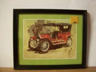 Up for auction is a pair of framed automotive prints. Each has an 