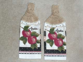 Crocheted top hanging kitchen apple themed towels with beige toppers 