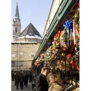 Stall Selling Christmas Decorations with Towers of Franziskanerkirche 