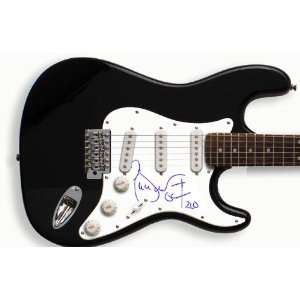 Pierce Brosnan Autographed Signed 007 Guitar & Exact Video Proof