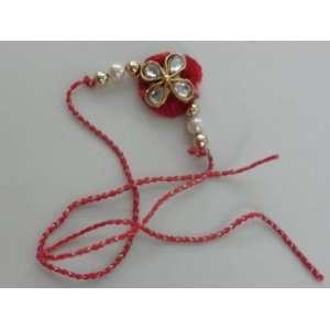  Rakhi (Rakhee)   Red Flower Rakhi with Kundan ($1.50 flat 