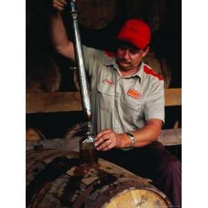  Taking Sample from Whisky Barrel at Makers Mark Distillery 