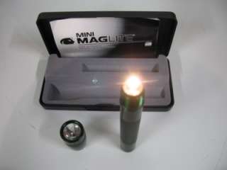 Up for auction is a Mini Maglite Flashlight