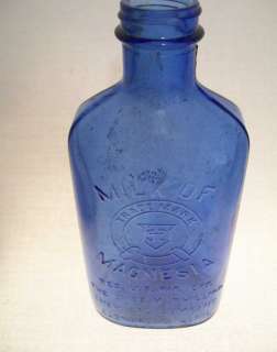 Vintatge Blue Milk Of Magnesia Embossed Bottle  