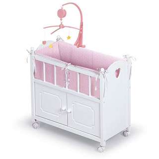   crib features a real musical mobile that plays a sweet lullaby, and a