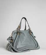 style #313875001 denim leather Paraty medium top handle bag